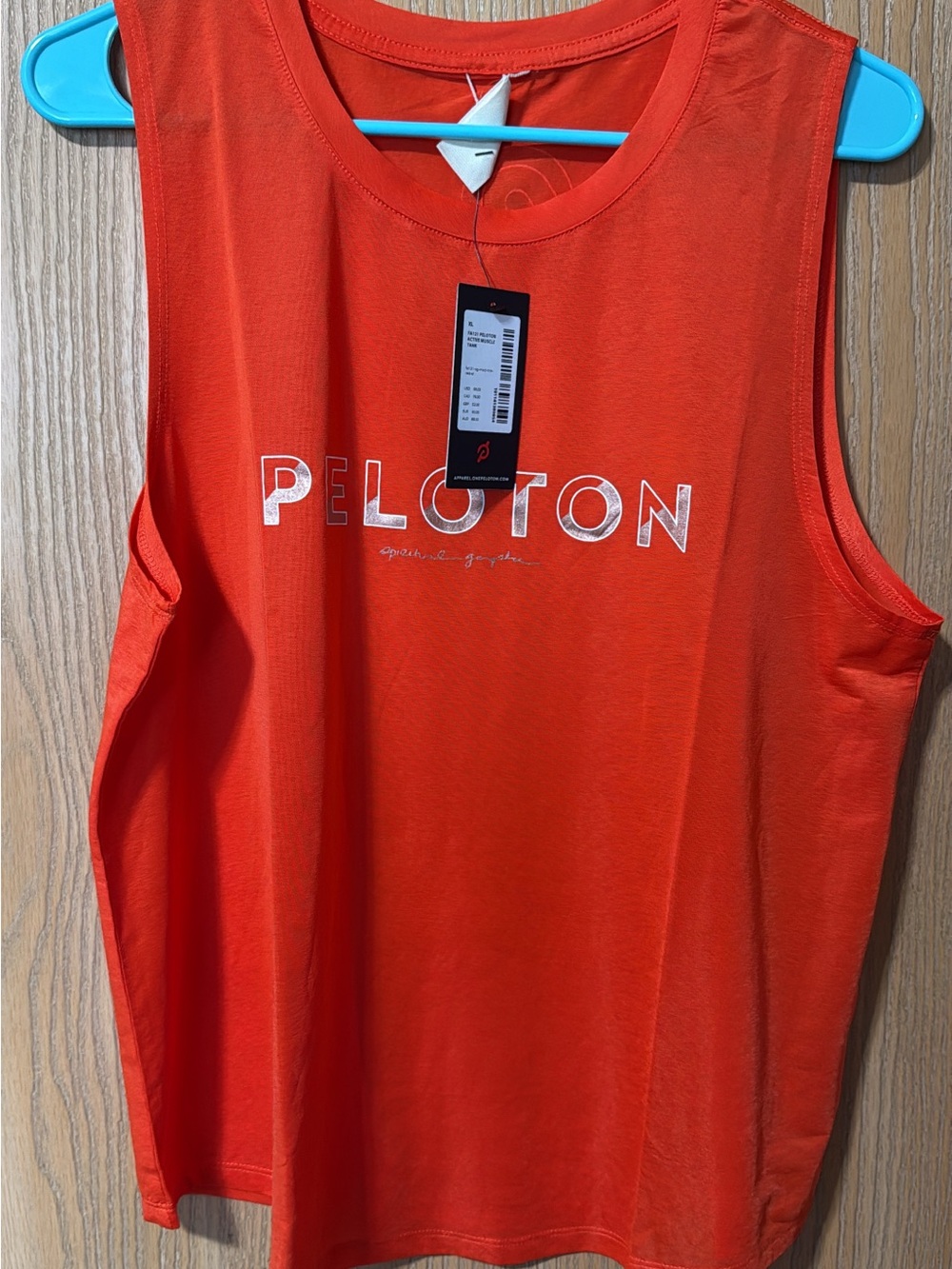 Peloton Spiritual Gangster Women’s Bright Orange Muscle Tee with White Logo